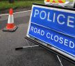 image of police road closed sign