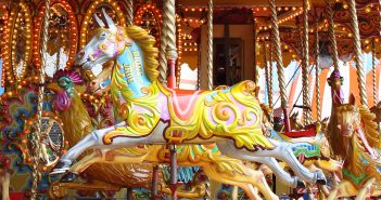 image of horses on a carousel