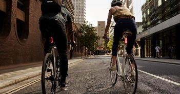 image of two people cycling