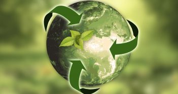 image of recycling logo around a green earth