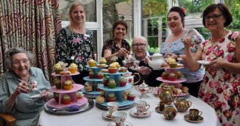 image of Heather Lawrence with residents at Amberwood House