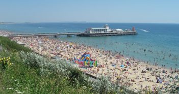 image of a packed bournemouth beach