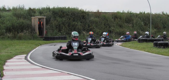 image of racers from South Coast Kart Club driving on the track