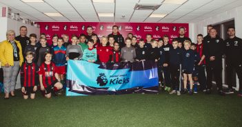Image of AFC Bournemouth stars Matt Butcher and Chris Mepham with the youngsters at one of the Premier League Kicks sessions at Vitality Stadium