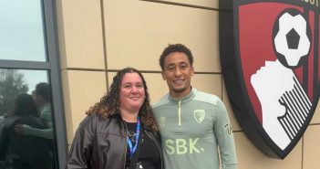 Rebekah Watts from BH1 Project and footballer Mark Tavener who presented the cheque.