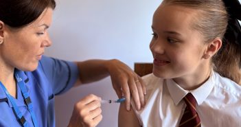 Dorset HealthCares Inurse vaccinating a child